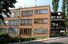 Shot up building in Sarajevo, Bosnia (3801776873).jpg
