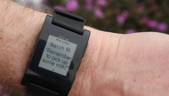 A smart clock displaying an email message