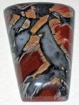 Cabochon of Tabu Tabu jasper (brecciated, with angular clasts cemented by grey chalcedony) جنوب أفريقيا