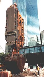 Clamshell-type slurry wall excavator