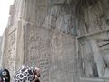 relief of Fath Ali Shah, the Qajar king, added to the ancient complex in the 19th century.