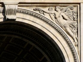 Figure of Victoria (northern façade, right spandrel)