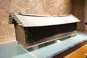 Dian bronze coffin in the shape of house