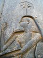 Seshat carved on the back of the throne of the seated statue of Rameses II.