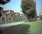 A row of parallel and connected factory buildings.