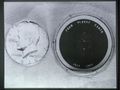 View of silicon disc with 73 messages, left by Buzz Aldrin