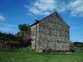 Stone barns are common in parts of the United Kingdom, United States, France, and some Mediterranean countries. The projecting stones are a style in part of England.