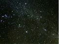 The brightest meteor, a fireball, leaves a smokey persistent trail drifting in high-altitude winds, which is seen at the right-hand side of the image left by Orionid.