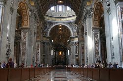 This photo of the interior reveals the near details of the arched ceiling which is divided into square coffers. The changes that Maderno made to the axis and width can be seen clearly in this picture.