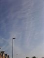 A shadow cast by vapour trail