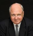 مايك مور خدم 1990 و. 1949 (age 76)