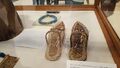 Sandals of Tutankhamun, showing foreigners alongside eight bows and the ninth being the sandal strap