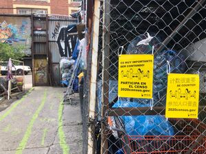 Flyers encouraging filling out the census hang at Sure We Can - Brooklyn, NY - 2020.jpg