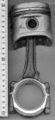 A piston and its connecting rod.