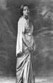 Woman in nivi sari & vaddanam.