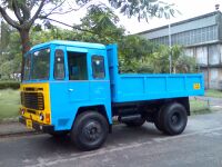 An Ashok Leyland Comet dump truck, an example of a very basic 4×2 dump truck used for payloads of 10 metric ton (11.0 short ton; 9.8 long ton) or less