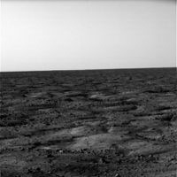 One of the first horizon images taken by Phoenix.