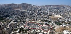 المخيم داخل الخط الأحمر والمنطقة المحيطة هي مدينة نابلس