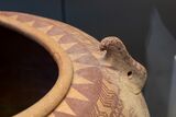 Falcon Horus, deity of Hierakonpolis, on a Naqada IIC jar, 3500 BCEح. 3500 BCE, British Museum EA36328.[62][63]