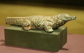 Statue of the crocodile god Sobek in fully animal form, possibly a cult image from a temple.[152] Nineteenth or twentieth century BC.